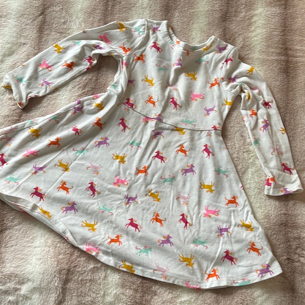 5T Cat & Jack dress. Gently used.Some noticeable staining around cuffs.